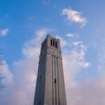 The Memorial Belltower against a blue sky on a winter day.