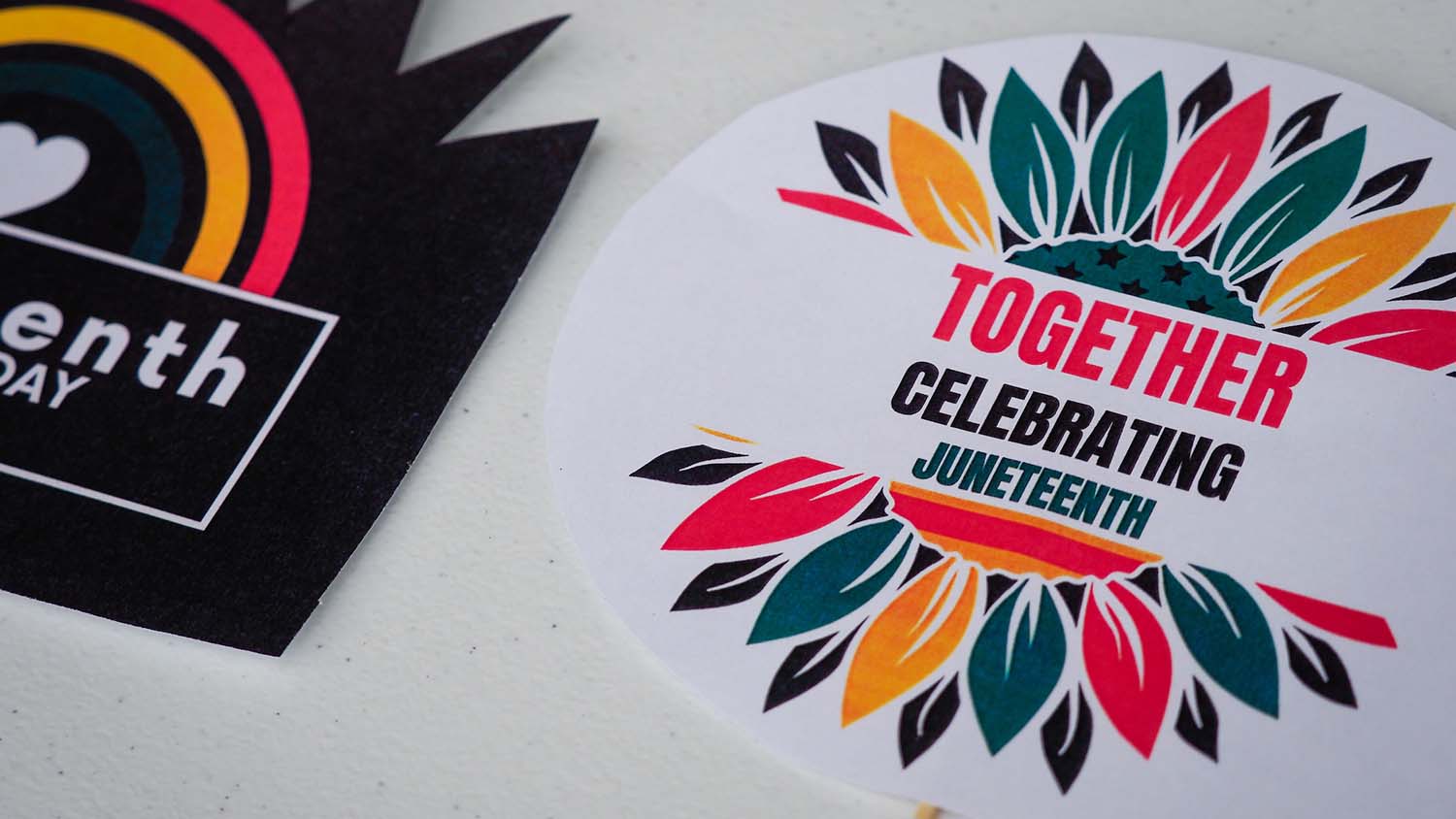 A sticker from a Juneteenth campus celebration reads "Together Celebrating Juneteenth."