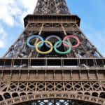 The Eiffel Tower with the logo of the Olympic Games. Ibex73. CC BY 4.0 via Wikimedia Commons