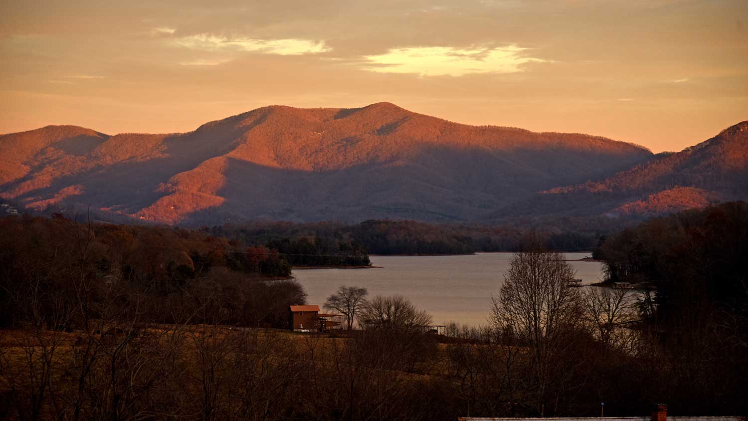 A vibrant sunset near the mountains of Western North Carolina.