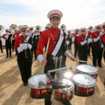 The NC State marching band gets ready to perform.