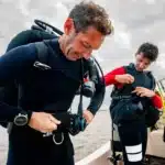 College of Veterinary Medicine Assistant Professor Tal Ben-Horin and his graduate student Zakir Bulmer prepare to scuba dive in the Pamlico Sound.