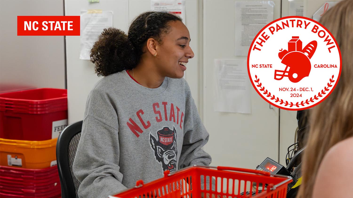 A student works at NC State's Food Pantry, alongside a graphic announcing the dates of the 2024 Pantry Bowl: Nov. 24 to Dec. 1.