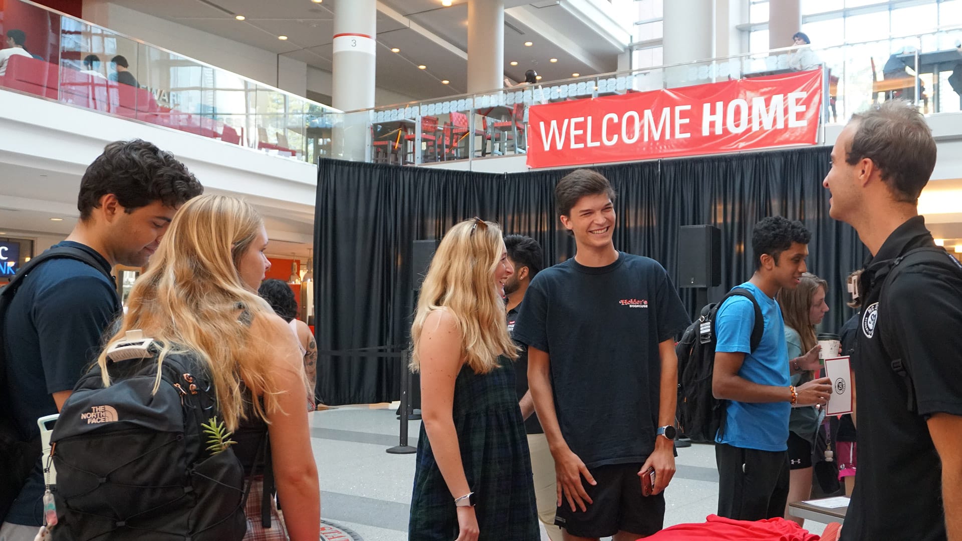 A view of the lobby in Talley Student Union shows members of Student Government engaging with other students at a tabling event.