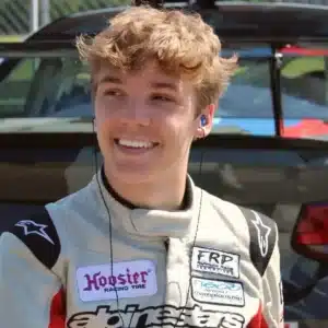 Fall graduate Lance Fenderson and his race car.