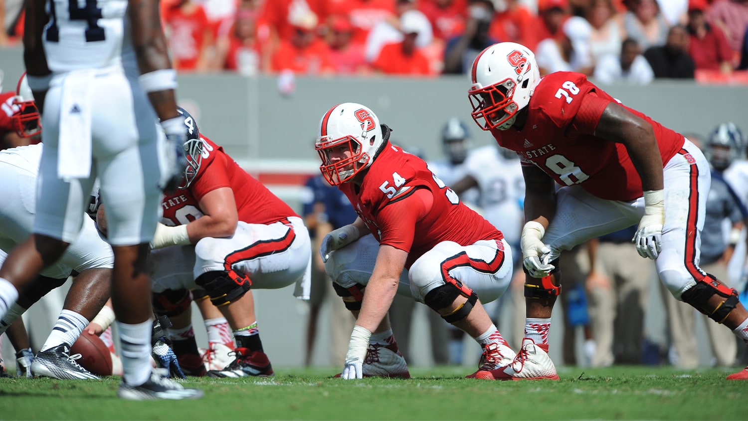 Joe Thuney (number 54) gets set for a play during a game at NC State.