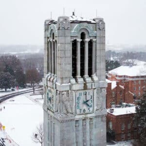 An aerial view of NC State's campus blanketed with snow.