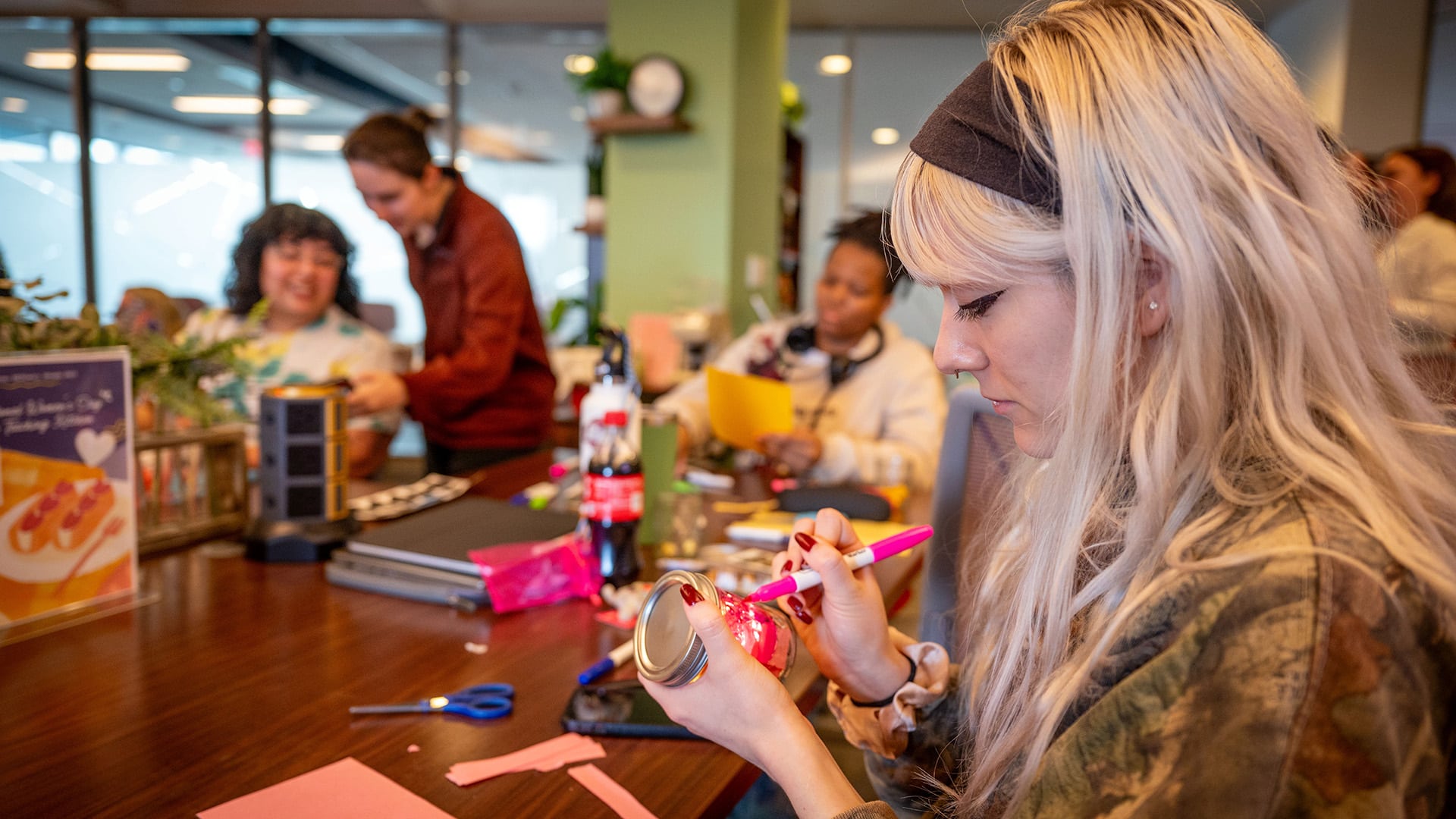 Students take part in a Crafting + Connecting event in NC State's Women's Center.