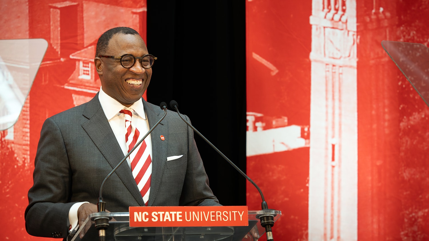 NC&#160;State University's 15th chancellor, Kevin Howell, smiles at the podium during the event announcing his appointment.